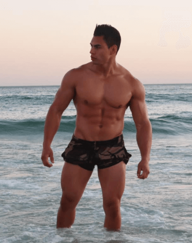 Juan of Bow Tie Boys on the beach as Sydney Stripper